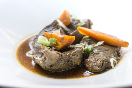 Closeup of pork stew Meat with vegetablesの写真素材