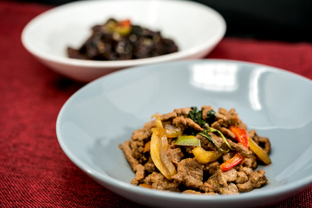 wok fried beef stir fry with sweet peppers and chinese vegetablesの写真素材