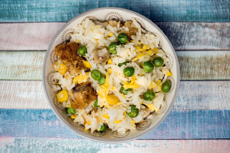 Homemade Chinese fried rice with vegetables and fried eggsの写真素材