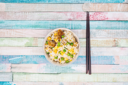 Homemade Chinese fried rice with vegetables and fried eggsの写真素材