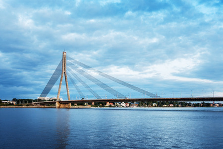 RIGA, LATVIA - August 28, 2017: The Vansu Bridge in Riga is a cable-stayed bridge that crosses the Daugava river in Rigaのeditorial素材