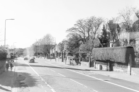 EDINBURGH, SCOTLAND - March 27, 2017: Street view of Historic Old Town Houses in Edinburgh, Scotland のeditorial素材