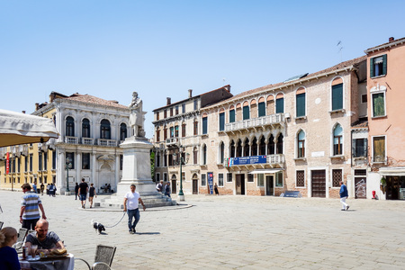 VENICE, ITALY - May 18, 2017 : Tourists foot Street in Venice. its entirety is listed as a World Heritage Site, along with its lagoon. VENICE, ITALY.のeditorial素材