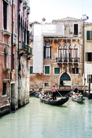 VENICE, ITALY - May 18, 2017 : View of water street and old buildings in Venice on May 18, 2017. its entirety is listed as a World Heritage Site, along with its lagoonのeditorial素材