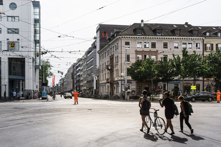 BASEL, SWITZERLAND - June 16, 2017: Tourists on foot Graben Street in Basel,Switzerlandのeditorial素材