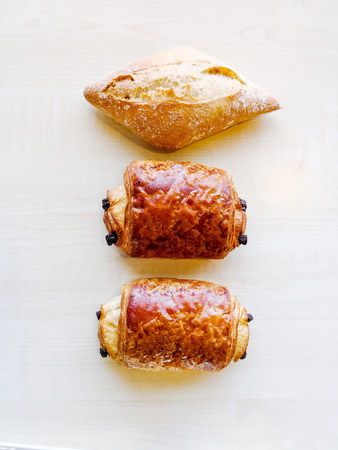 Delicious breakfast bread on table
