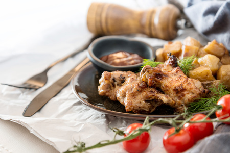 roasted sleeves chicken with potatoes and barbecue sauceの写真素材