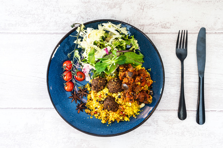 Kofta Tagine Moroccan Meatballs Served With Semolina and Vegetablesの写真素材