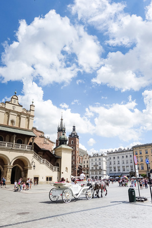 KRAKOW, POLAND - August 27, 2017: a horse and carriage carries tourists in Krakow, Polandのeditorial素材
