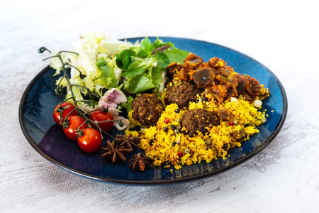 Kofta Tagine Moroccan Meatballs Served With Semolina and Vegetablesの写真素材