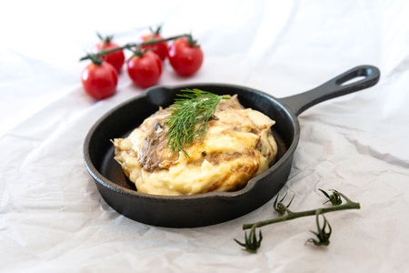 Dish made with cooked duck meat, dehydrated potato, fresh cream of mushroom and cheeseの写真素材