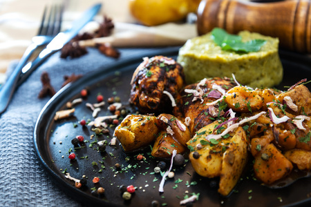 roasted sleeves chicken with potatoes and barbecue sauceの写真素材