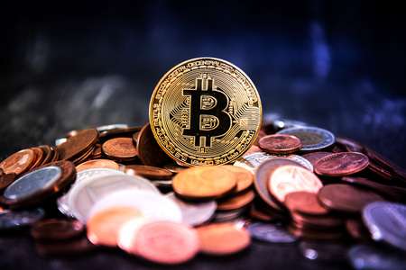 Golden Bitcoin and mound of money. Digital cryptocurrency concept