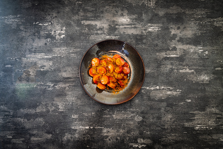 Tasty german sausage served with sauceの写真素材