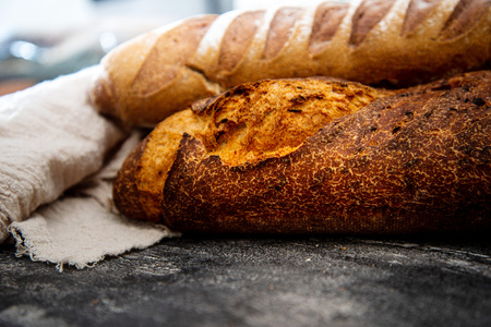 Assortment of baked French breadの写真素材