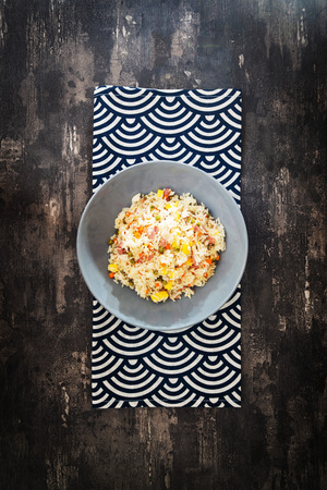 Cantonese fried basmati rice with ham and eggsの写真素材