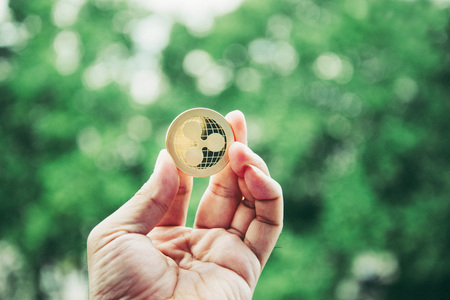 Crypto Ripple Coin currency Bitcoin Outdoor background