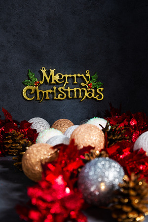 Merry Christmas - christmas decoration over dark backgroundの写真素材