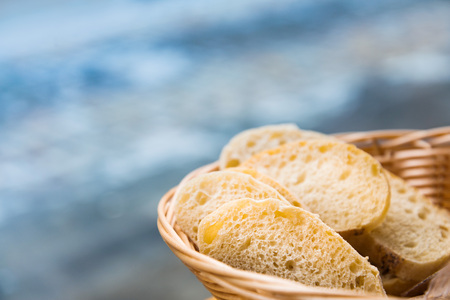 bread in basket - little roll breads in basket on table