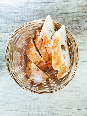 bread in basket - little roll breads in basket on tableの写真素材