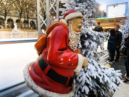 PARIS, FRANCE - DECEMBER 5, 2018: Santa Claus decoration at the Tuileries Garden Christmas Market in Parisのeditorial素材