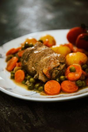 Beef meat stewed with potatoes-Traditional French cuisine Beef Bourguignon potatoes carrots in persilladeの写真素材