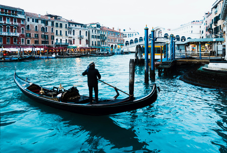 VENICE, ITALY- December 21, 2017 : Tourists on water street with Gondola in Venice,ITALYのeditorial素材