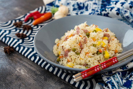 Cantonese fried basmati rice with ham and eggsの写真素材