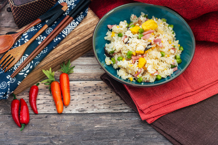 Cantonese fried basmati rice with ham and eggsの写真素材