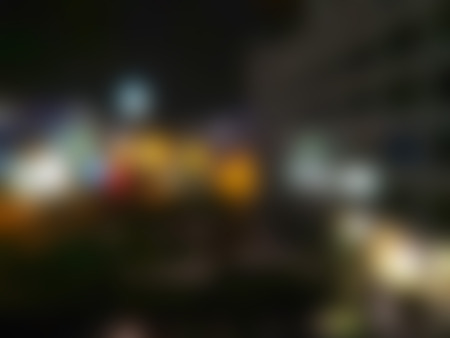 City Night abstract background with bokeh defocused lights and shadow