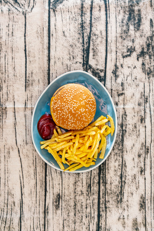 Cheese burger - American cheese burger with Golden French friesの写真素材