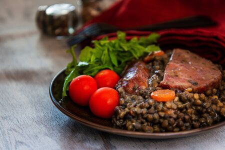 Green lentils with smoked pork sausage smoked choice, carrots and onionsの写真素材