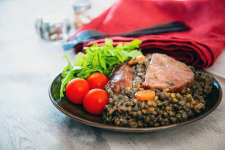 Green lentils with smoked pork sausage smoked choice, carrots and onionsの写真素材