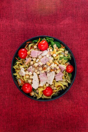 cereal specialties cooked with salad, roasted chicken aiguillette cured with salted and baconの写真素材