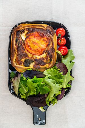 tomato vegetable pie with zucchini and eggplant, chiliの写真素材