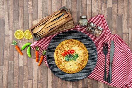 French Omelette with Potatoes, Mushroom and Saladの写真素材