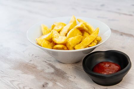Golden French fries potatoes ready to be eaten