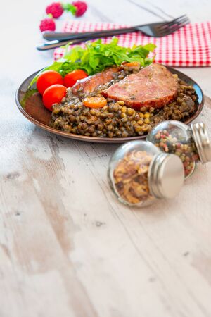 Green lentils with smoked pork sausage smoked choice, carrots and onionsの写真素材