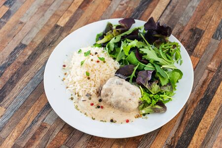Veal Paupiette stewed with cream and rice
