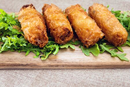 pork spring rolls Rice cakes stuffed with a pork stuffing accompanied by sauceの写真素材