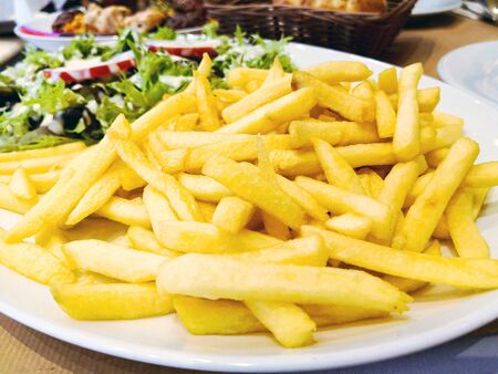 Golden French fries potatoes ready to be eaten