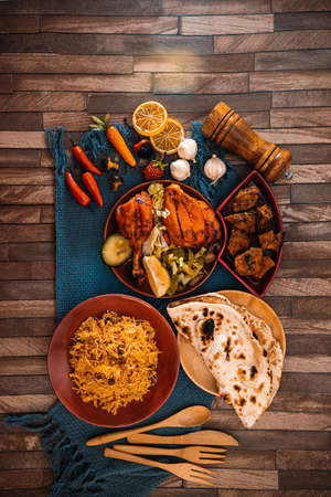 Traditional Indian food chicken tandoori and Tikka with garlic naanの写真素材