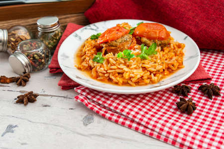 Stuffed tomatoes and rice with tomatoの写真素材