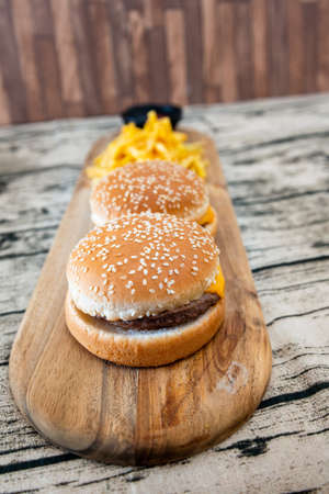American cheese burger with Golden French friesの写真素材