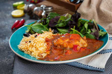 Basque Braised Chicken With Peppers and riceの写真素材