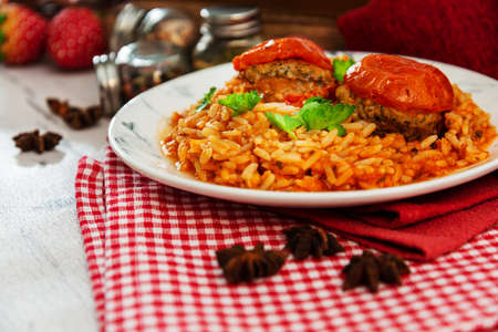 Stuffed tomatoes and rice with tomatoの写真素材