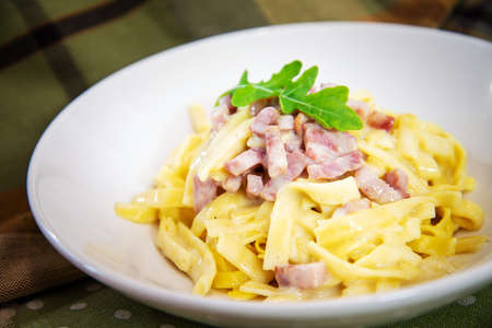 tasty Carbonara pasta on the tableの写真素材