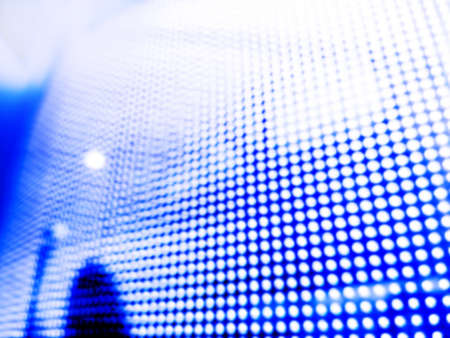 Abstract background made of defocused city lights and shadowsの写真素材