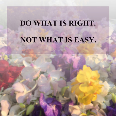 Inspirational quote "do what is right not what is easy" on blurred orchid flowers backgroundの写真素材