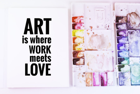 Inspirational quote "Art is where work meets love" on blurred background with vintage filterの写真素材